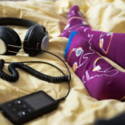 Str�mper med hovedtelefoner